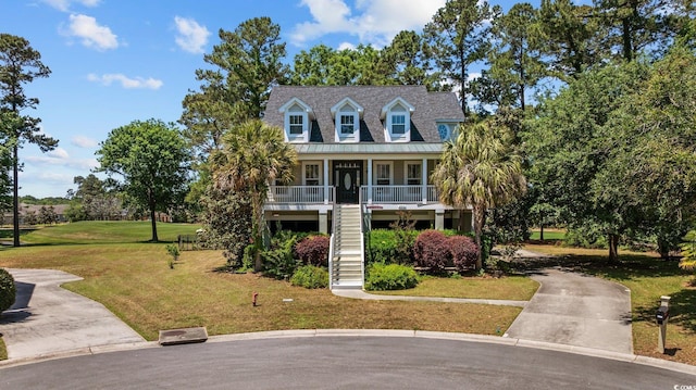 854 Falkirk St, Myrtle Beach, SC 29579 - view of front of home featuring stairs, a porch, a front yard, and metal roof