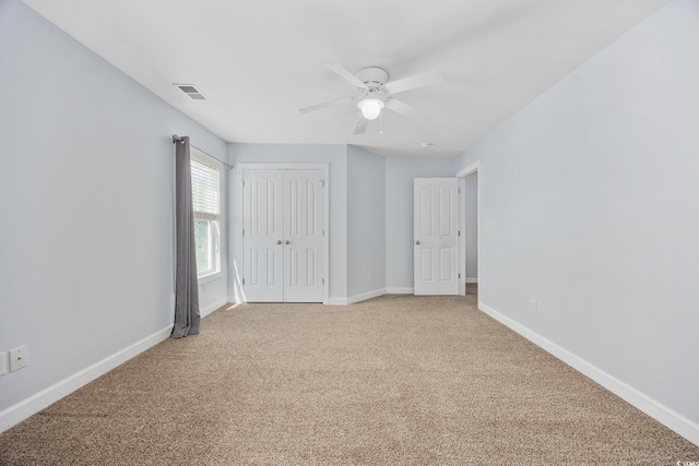 854 Falkirk St, Myrtle Beach, SC 29579 - unfurnished bedroom featuring light carpet, baseboards, and a closet