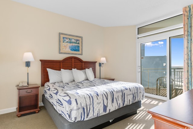2501 S Ocean Blvd Unit 831, Myrtle Beach, SC 29577 - bedroom featuring light carpet, access to outside, and baseboards