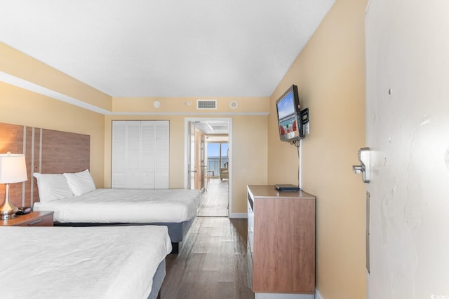 2000 Ocean Blvd N Unit Ph11, Myrtle Beach, SC 29577 - bedroom with dark wood finished floors and baseboards
