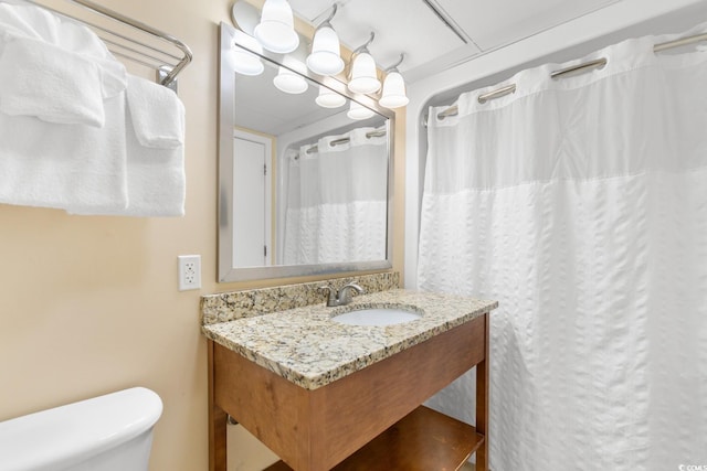 2000 Ocean Blvd N Unit Ph12, Myrtle Beach, SC 29577 - full bathroom with toilet, vanity, and a shower with shower curtain