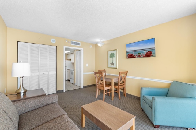 2000 Ocean Blvd N Unit Ph12, Myrtle Beach, SC 29577 - living room featuring carpet floors, baseboards, and a textured ceiling