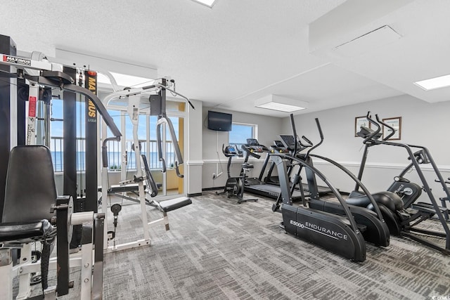 2000 Ocean Blvd N Unit Ph12, Myrtle Beach, SC 29577 - gym with baseboards and a textured ceiling