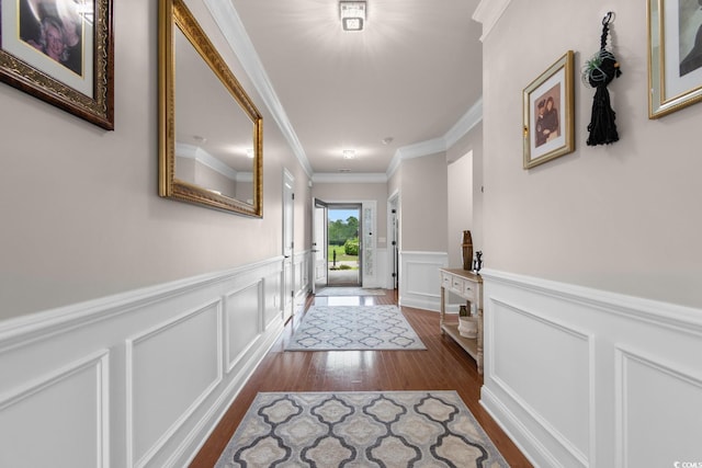 1035 Brentford Pl, Myrtle Beach, SC 29579 - doorway with ornamental molding, wainscoting, dark wood-style floors, and a decorative wall