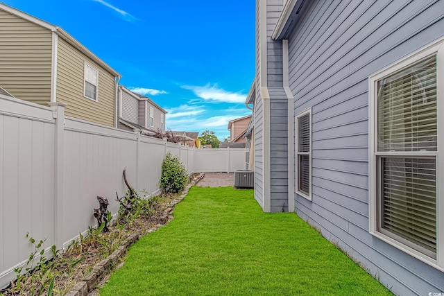 934 Tiffany Ln, North Myrtle Beach, SC 29582 - view of yard with central AC unit