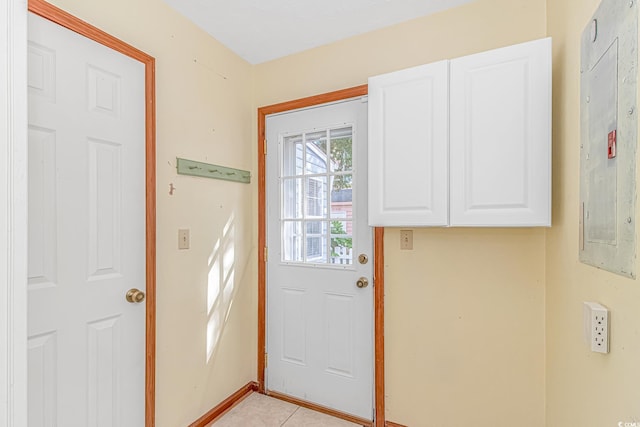 934 Tiffany Ln, North Myrtle Beach, SC 29582 - doorway with baseboards and light tile patterned flooring