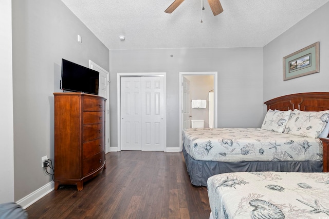 bedroom featuring wood finished floors, a closet, baseboards, a textured ceiling, and a ceiling fan