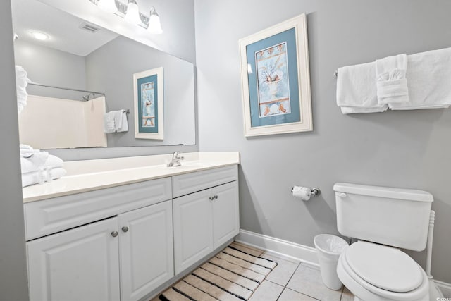 full bath with baseboards, toilet, tile patterned flooring, and vanity
