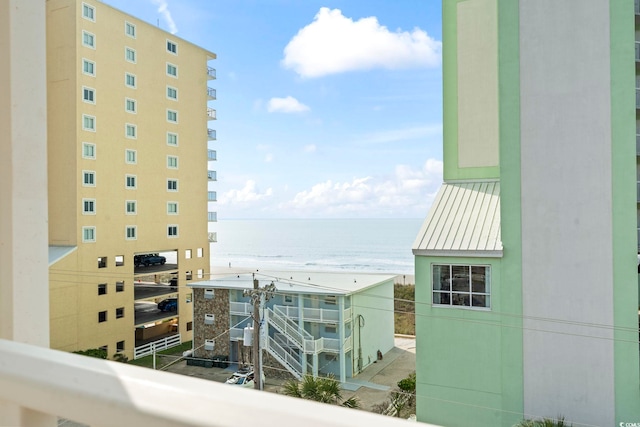 balcony featuring a water view