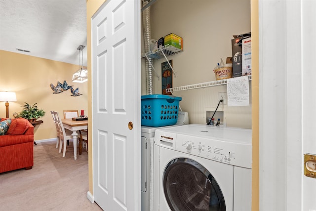 601 Hillside Dr Unit 4424, North Myrtle Beach, SC 29582 - laundry room with washer and clothes dryer, light carpet, and baseboards