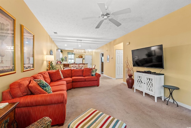 601 Hillside Dr Unit 4424, North Myrtle Beach, SC 29582 - living area with a textured ceiling, carpet flooring, a ceiling fan, and baseboards