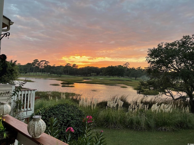 9551 Edgerton Dr Unit C-6, Myrtle Beach, SC 29572 - yard at dusk featuring a water view