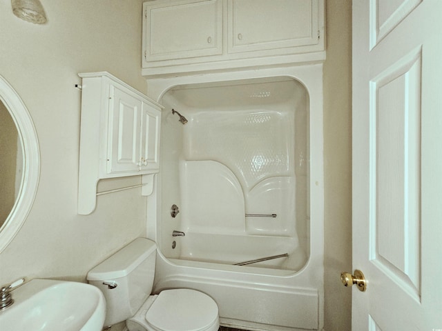 full bath with a sink, toilet, and shower / tub combination