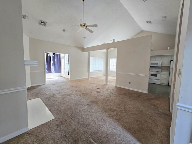 unfurnished living room featuring carpet flooring, ceiling fan, high vaulted ceiling, and baseboards