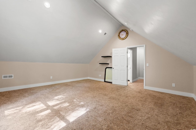 54 River Birch Ln, Pawleys Island, SC 29585 - additional living space featuring vaulted ceiling, baseboards, and light colored carpet