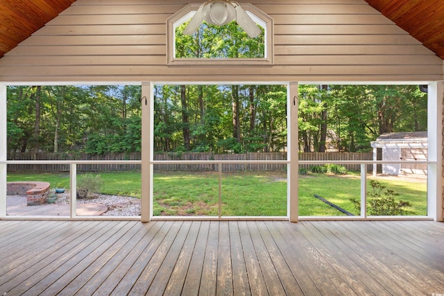54 River Birch Ln, Pawleys Island, SC 29585 - unfurnished sunroom featuring an outdoor fire pit and lofted ceiling
