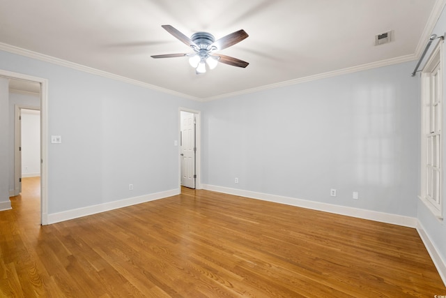 54 River Birch Ln, Pawleys Island, SC 29585 - empty room featuring a ceiling fan, crown molding, light wood-type flooring, and baseboards
