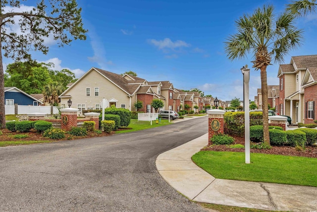 4355 Willoughby Ln Unit 401, Myrtle Beach, SC 29577 - view of asphalt street featuring a residential view and street lights