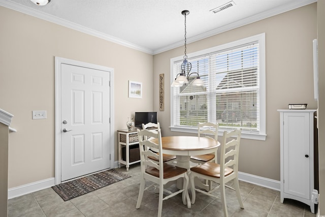 4355 Willoughby Ln Unit 401, Myrtle Beach, SC 29577 - dining area with crown molding, plenty of natural light, baseboards, light tile patterned floors, and a textured ceiling