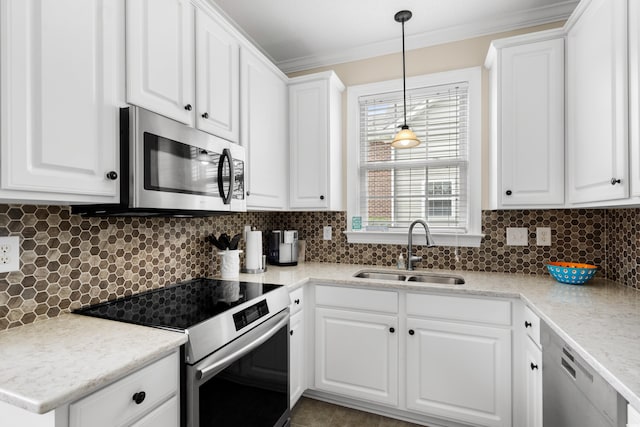 4355 Willoughby Ln Unit 401, Myrtle Beach, SC 29577 - kitchen with stainless steel appliances, a sink, crown molding, and white cabinets