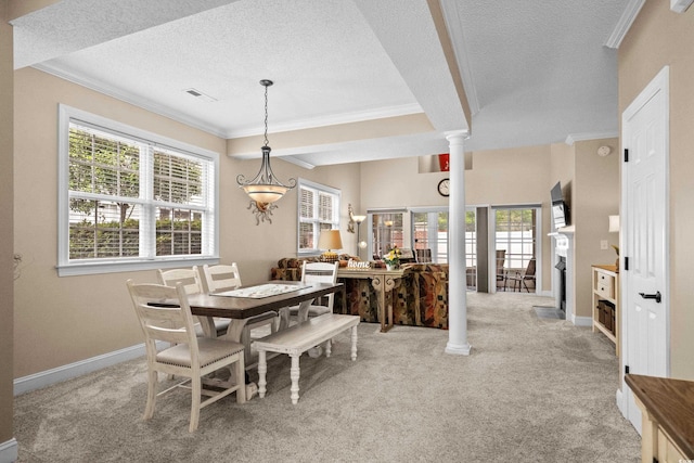 4355 Willoughby Ln Unit 401, Myrtle Beach, SC 29577 - dining area with crown molding, light colored carpet, a textured ceiling, healthy amount of natural light, and ornate columns