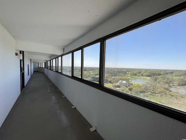 9500 Shore Dr Unit 17B, Myrtle Beach, SC 29572 - corridor featuring concrete flooring and a water view