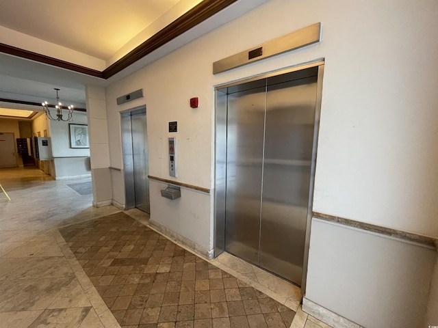 9500 Shore Dr Unit 17B, Myrtle Beach, SC 29572 - corridor with elevator, a chandelier, inlaid floor details, and ornamental molding