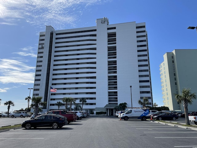 9500 Shore Dr Unit 17B, Myrtle Beach, SC 29572 - view of building exterior featuring uncovered parking