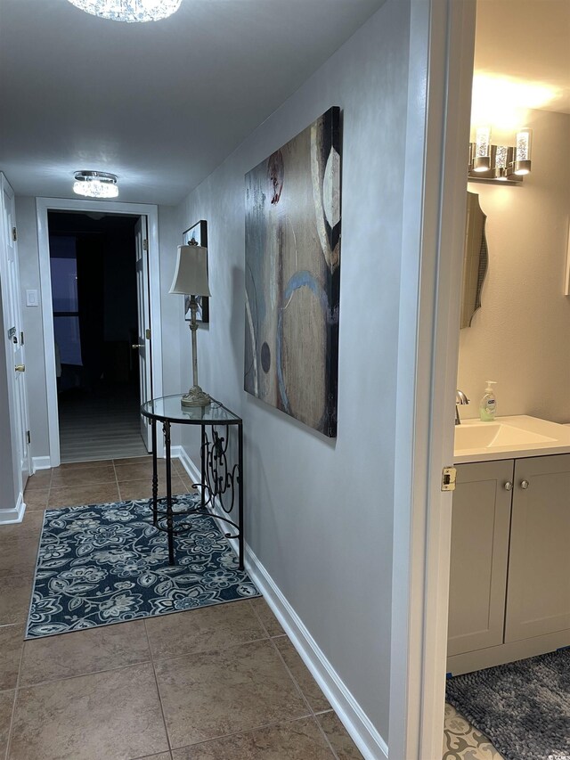 9500 Shore Dr Unit 17B, Myrtle Beach, SC 29572 - hall with a sink and tile patterned floors