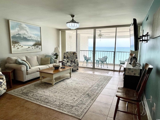 9500 Shore Dr Unit 17B, Myrtle Beach, SC 29572 - living area featuring tile patterned flooring, expansive windows, and a chandelier