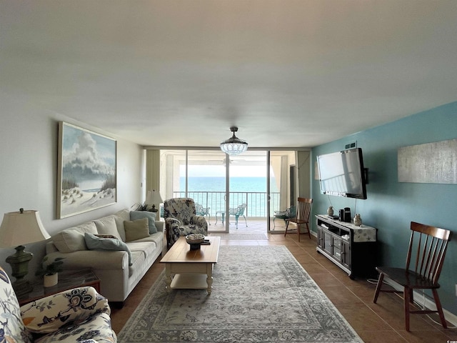 9500 Shore Dr Unit 17B, Myrtle Beach, SC 29572 - living area featuring dark tile patterned floors, floor to ceiling windows, and a chandelier
