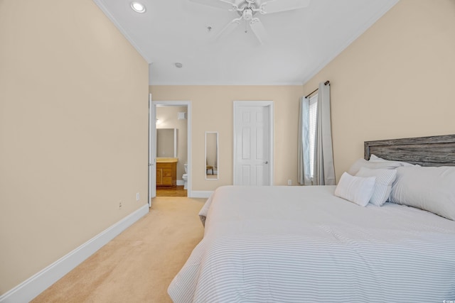 8546 San Marcello Dr Unit 1-102, Myrtle Beach, SC 29579 - bedroom with light colored carpet, crown molding, baseboards, ceiling fan, and ensuite bath