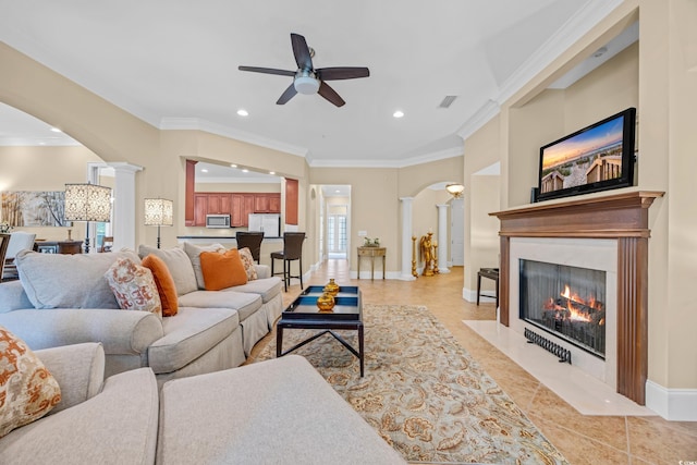 8546 San Marcello Dr Unit 1-102, Myrtle Beach, SC 29579 - living area featuring decorative columns, arched walkways, recessed lighting, ceiling fan, and crown molding
