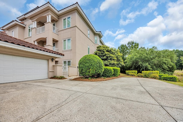 8546 San Marcello Dr Unit 1-102, Myrtle Beach, SC 29579 - view of property featuring driveway and a garage