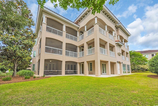 8546 San Marcello Dr Unit 1-102, Myrtle Beach, SC 29579 - rear view of property featuring stucco siding, a yard, and french doors
