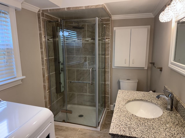 full bath featuring a stall shower, ornamental molding, tile patterned floors, vanity, and toilet