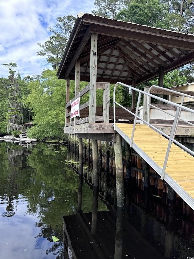 dock area featuring a water view
