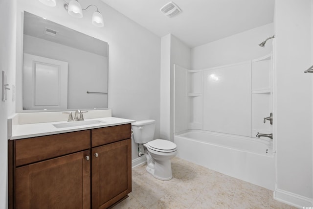 bathroom featuring toilet, vanity, washtub / shower combination, and baseboards