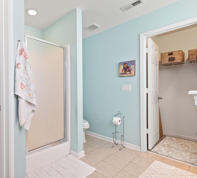 424 Enderby Way, Little River, SC 29566 - full bath featuring a stall shower, toilet, tile patterned floors, and baseboards
