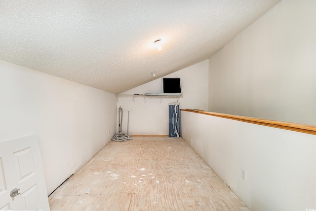 1435 Saint Thomas Cir Unit E-1, Myrtle Beach, SC 29577 - additional living space with lofted ceiling and a textured ceiling
