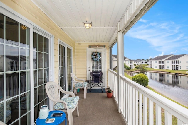 4925 Pond Shoals Ct Unit 202, Myrtle Beach, SC 29579 - balcony featuring a water view and a residential view
