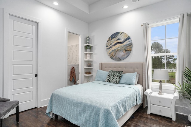 bedroom with dark wood-type flooring and recessed lighting