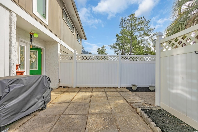 view of patio / terrace with fence and area for grilling