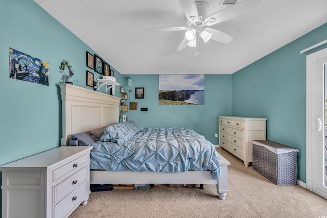 bedroom featuring light carpet and a ceiling fan