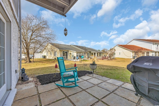 view of patio with a residential view and grilling area
