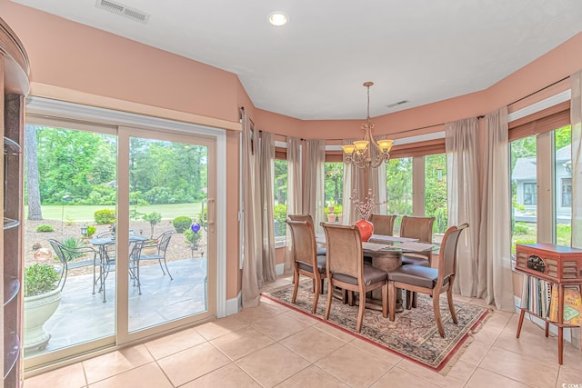 1206 Spinnaker Dr, North Myrtle Beach, SC 29582 - dining area featuring a chandelier, light tile patterned floors, and recessed lighting