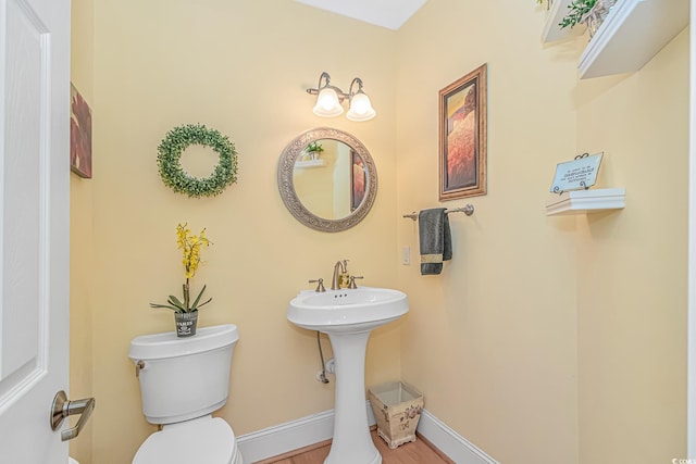 1206 Spinnaker Dr, North Myrtle Beach, SC 29582 - bathroom with toilet and wood finished floors
