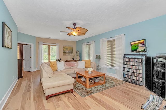 1206 Spinnaker Dr, North Myrtle Beach, SC 29582 - living room with light wood-style flooring and ceiling fan