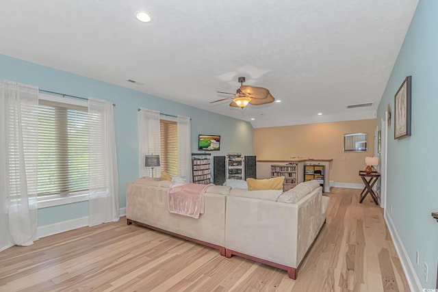 1206 Spinnaker Dr, North Myrtle Beach, SC 29582 - living area with light wood finished floors, ceiling fan, and recessed lighting