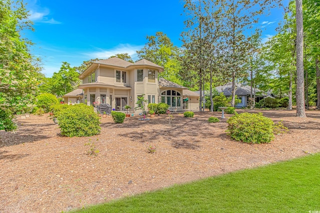 1206 Spinnaker Dr, North Myrtle Beach, SC 29582 - rear view of property featuring roof with shingles